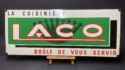 LACO - La Cuisinière - Brûle de vous servir, Emailschild aus der Emaillerie Alsacienne Strassburg, um 1950