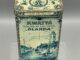 Vintage Kwatta Kakao-Blechdose mit blau-weiß illustrierten niederländischen Szenen, beschriftet mit "Cacao Alcalinisé Olanda" und "Poids Net 250 Gramm".