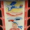 Spardose aus den 1930er Jahren - Flugzeug, Auto, Zug, lithografiertes Blech